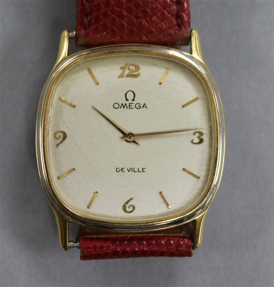 A gentlemans gold plated and steel Omega de Ville wrist watch, no winding crown.